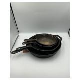 4 cast iron pans