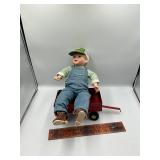 Porcelain doll and Ertl trailer