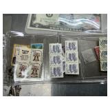 2 dollar bills and stamps
