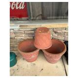 3 terracotta planters