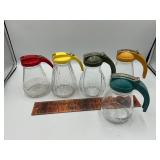 5 vintage syrup jars