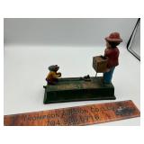 Cast iron monkey bank