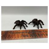 2 cast iron spiders