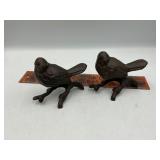 2 cast iron birds