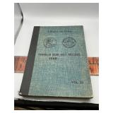Book with 6 Franklin half dollars