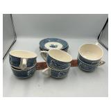 Blue and white plates and cups