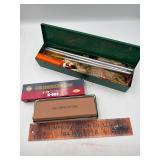 Gun cleaning kit and 2 sharpening stones