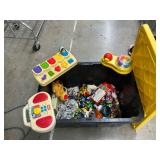 Tote with miscellaneous toys and stuffies