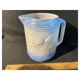 Blue/white salt glaze pitcher with trees