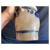Small decorated salt glaze pottery jar is damaged