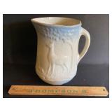 Blue/white salt glaze pitcher with deer