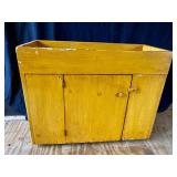 Yellow primitive dry sink