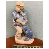 Child and dog statue