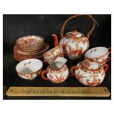 Vintage tea set with geisha girl cups