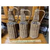 3 wicker covered bottles
