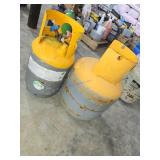 Two Yellow-Top Compressed Gas Cylinders