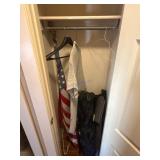 Closet Contents Including Flag, Clothing, and Misc
