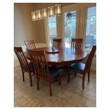 Oval Wood Dining Table With 6 Chairs and Lazy Susa