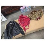 Three Items: Leather Jacket, Red Bag, and Tapestry