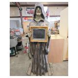 Human-Sized Hooded foam Figure With Framed Chalkbo