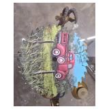 Circular Saw Blade With Artwork Depicting a Red Tr