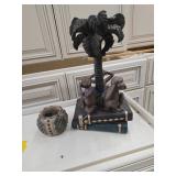 Decorative Sculpture Featuring Monkeys and Palm Tr