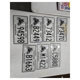 Seven Arkansas Antique Car License Plates