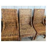 Threeï¿½Sanibel style dining chair made of woven rat