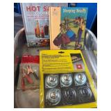 Various Items Including Cookbook, Roller Set, and