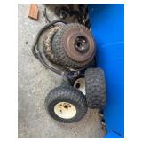 Five 14ï¿½7.00-6 Tires with Rims and One Rusted Hub