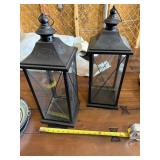 Two Black Metal and Glass Lanterns with Decorative