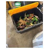 Black and Yellow Storage Bin with Assorted Plastic