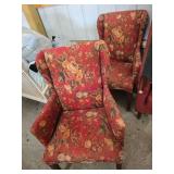 Two Upholstered Wingback Chairs with Floral Patter