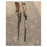 Two Aged Firearms with Wooden Stocks and Metal Eng