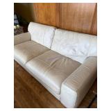 Beige Leather Couch With Two Cushions