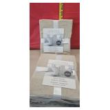 3 tan bath towels