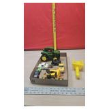 John Deere flashlight. And toy cars
