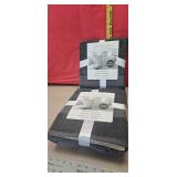 3 gray bath towels