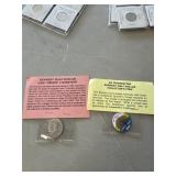 Kennedy Half Dollar and collector coin
