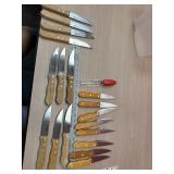 10 Chef Deluxe knives and 8 stainless steel steak