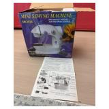 New in box Mini Sewing Machine