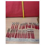 Red handle silver ware