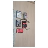 Canon, olympus and Kodak digital cameras