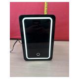 Desk top Mini Refrigerator powers on