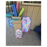 Pool noodles, wake boards and fishing pole