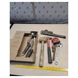 Hammers, pipe wrench  and tools