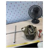 Tire iron and tool bag of tools