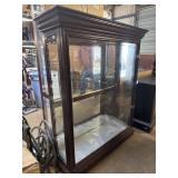 Lighted display  case with glass shelves end
