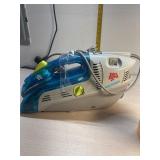 Dirt a devil spot scrubber powered on