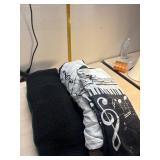 Green and black Afghan, music duvet and pillow